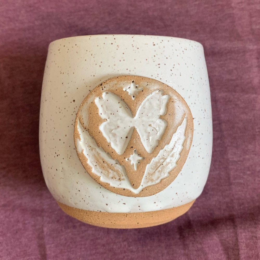 Sister Nettle logo cup